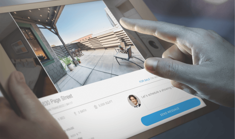 A tablet displaying a high end real estate listing